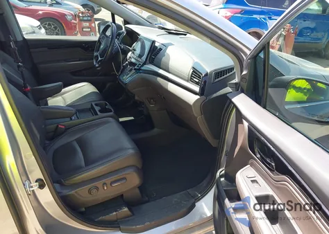 2022 Honda Odyssey Touring z USA, uszkodzony, nr VIN 5FNRL6H8XNB025847